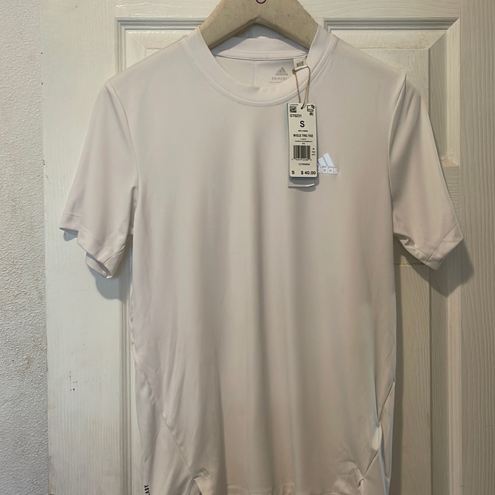 Adidas T shirt. Size S. New .